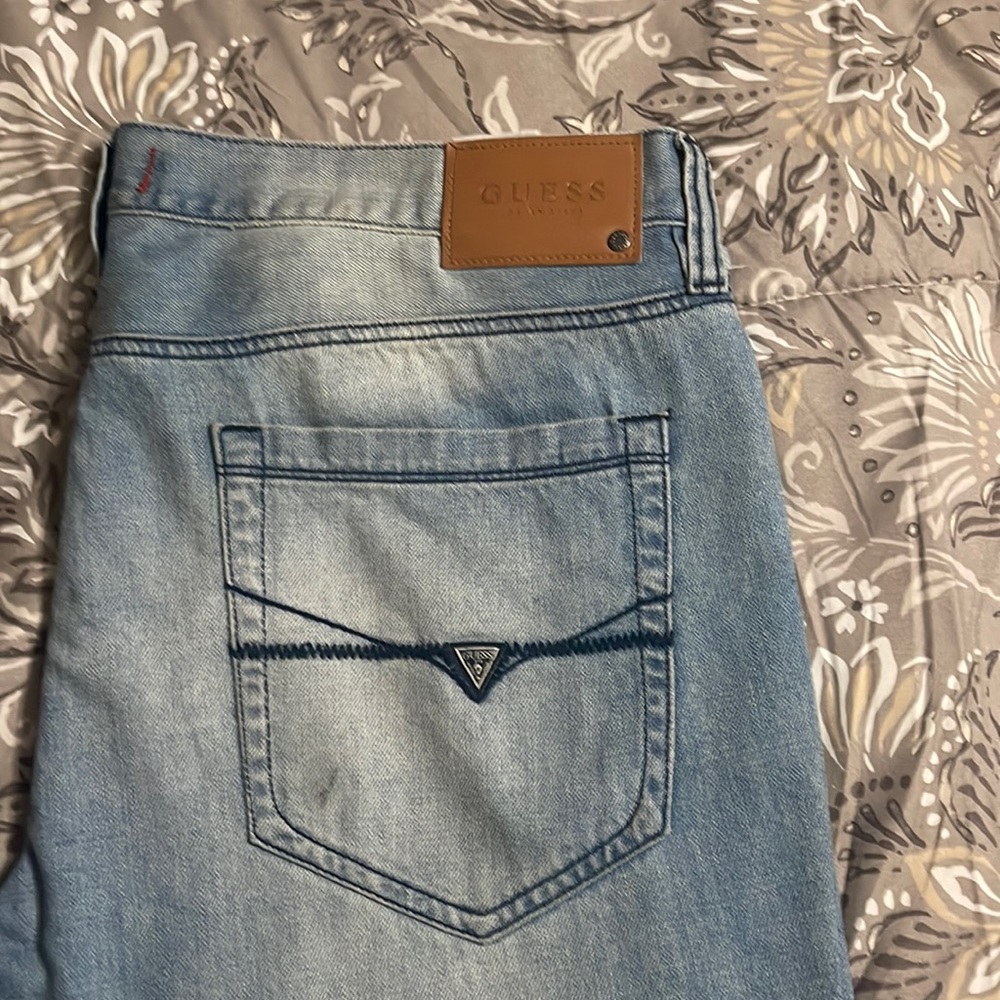 Blue Guess denim jeans maybe worn 3 times Dry cleaned only. Great condition